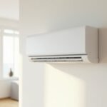 White wall-mounted split-system air conditioner indoor head unit with louvres open in a sunlit modern Australian living room